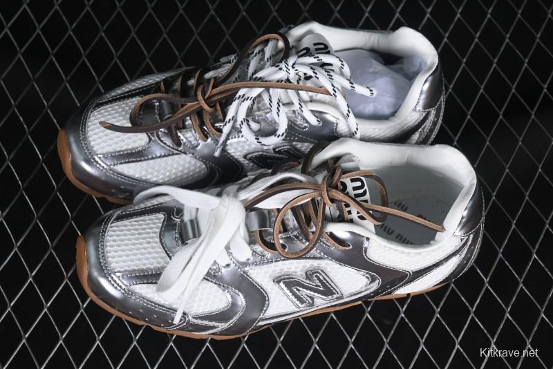New Balance 530 Metallic Silver Sneakers – Stylish & Sporty Design